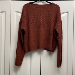 Sweater with open stitch detail
